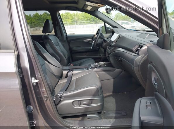 5FNYF8H55MB027248 2021 HONDA PASSPORT Black Вид салону спереду