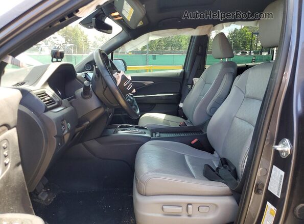 5FNYF8H55MB034510 2021 HONDA PASSPORT Gray Вид салону спереду
