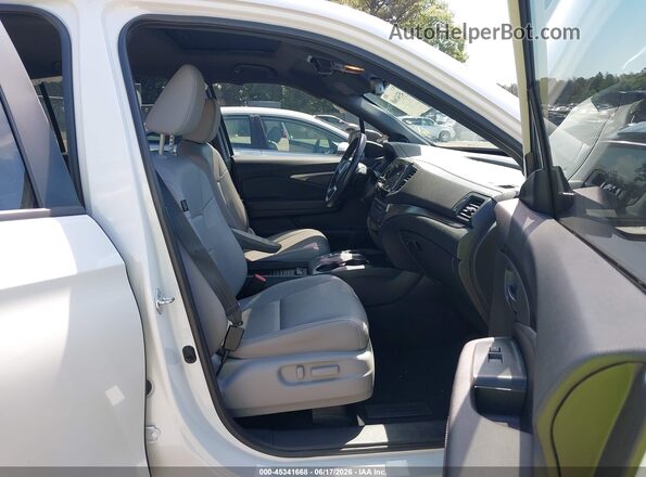 5FNYF8H55NB018678 2022 HONDA PASSPORT White Vista interior delantera