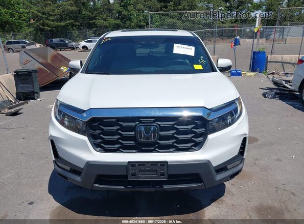 5FNYF8H55NB018678 2022 HONDA PASSPORT White Vista interior trasera