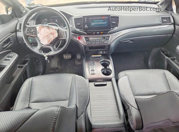 5FNYF8H56PB011631 2023 HONDA PASSPORT Blue Dashboard view