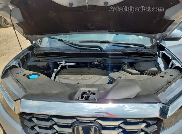 5FNYF8H56PB011631 2023 HONDA PASSPORT Blue Engine compartment view