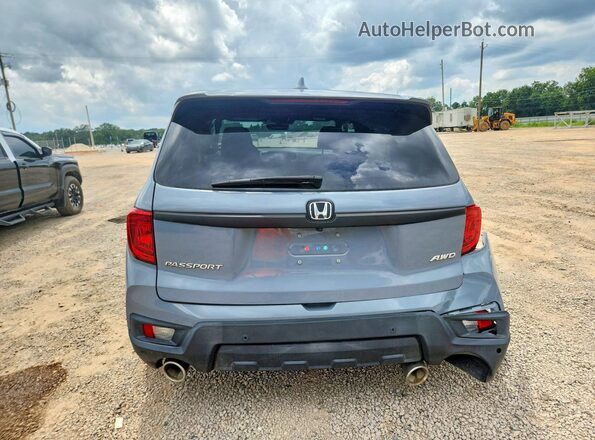 5FNYF8H56PB011631 2023 HONDA PASSPORT Blue Rear view