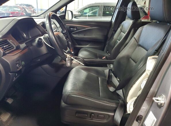5FNYF8H57MB025078 2021 HONDA PASSPORT Серебряный Вид салона спереди