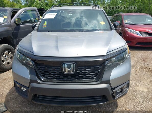 5FNYF8H58MB000139 2021 HONDA PASSPORT Silver Սալոնի հետևի տեսք