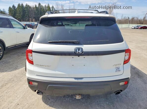 5FNYF8H58MB011075 2021 HONDA PASSPORT White Rear view