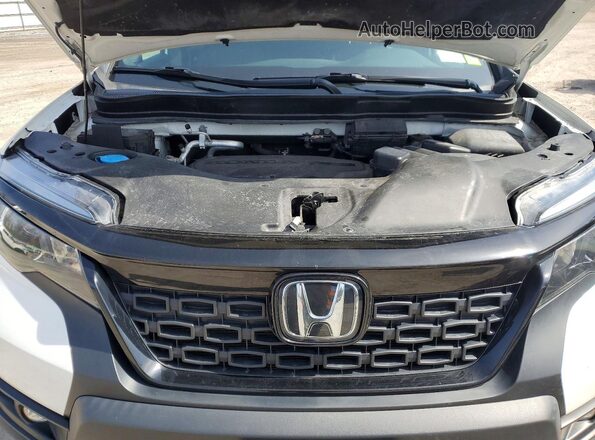 5FNYF8H58MB011075 2021 HONDA PASSPORT White Engine compartment view