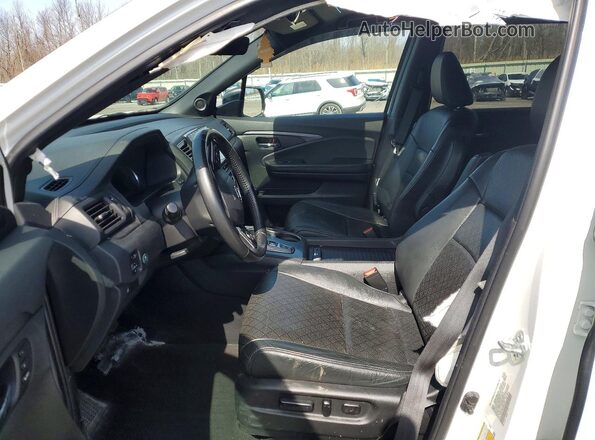 5FNYF8H58MB011075 2021 HONDA PASSPORT White Front interior view