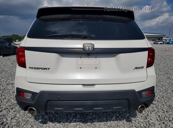 5FNYF8H58PB039365 2023 HONDA PASSPORT White Rear view