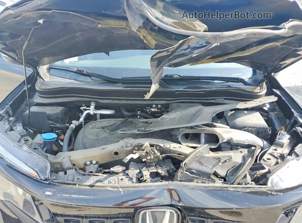 5FNYF8H59MB012915 2021 HONDA PASSPORT Black Vista del compartimento del motor