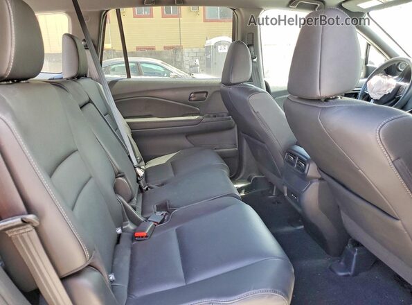 5FNYF8H59RB015580 2024 HONDA PASSPORT Black Vista interior trasera
