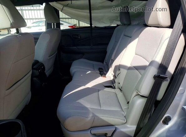 5FNYF8H5XRB018035 2024 HONDA PASSPORT Silver Vista interior trasera