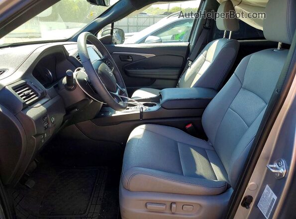 5FNYF8H5XRB018035 2024 HONDA PASSPORT Silver Vista interior delantera