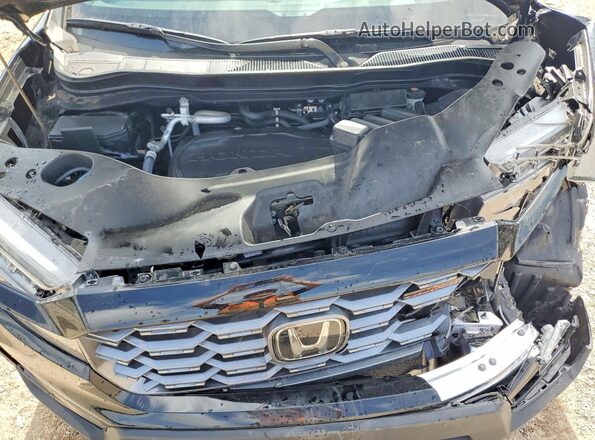 5FNYF8H60RB021938 2024 HONDA PASSPORT Black Rear interior view