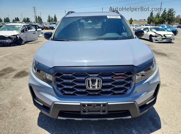 5FNYF8H61PB035893 2023 HONDA PASSPORT Blue Front view