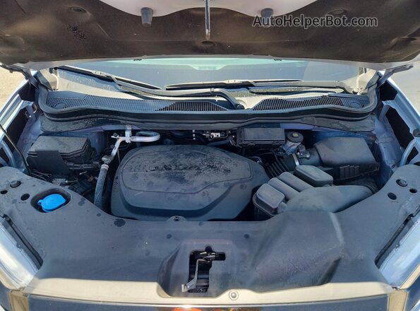 5FNYF8H61PB035893 2023 HONDA PASSPORT Blue Rear interior view