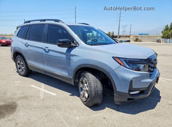 5FNYF8H61PB035893 2023 HONDA PASSPORT Blue Front right