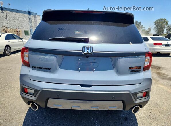 5FNYF8H61PB035893 2023 HONDA PASSPORT Blue Rear view