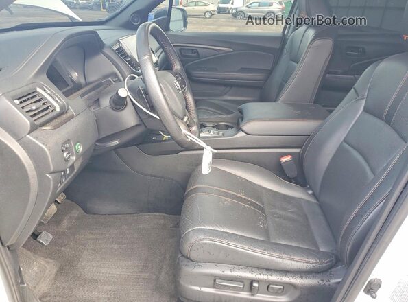 5FNYF8H65RB003953 2024 HONDA PASSPORT White Вид салону спереду