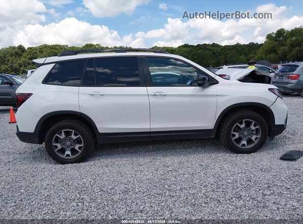 5FNYF8H66PB012481 2023 HONDA PASSPORT White Vista interior trasera