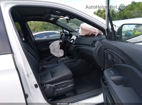 5FNYF8H66PB012481 2023 HONDA PASSPORT White Vista interior delantera