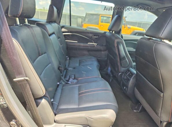 5FNYF8H66PB013744 2023 HONDA PASSPORT Черный Вид задних сидений