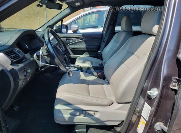 5FNYF8H96MB021641 2021 HONDA PASSPORT Gray Vista interior delantera