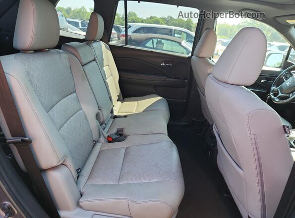 5FNYF8H96MB021641 2021 HONDA PASSPORT Gray Vista interior trasera
