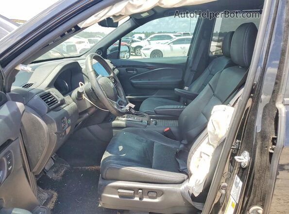 5FNYF8H98MB013122 2021 HONDA PASSPORT Black Front interior view