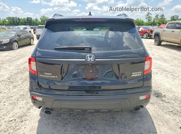 5FNYF8H98MB013122 2021 HONDA PASSPORT Black Rear view
