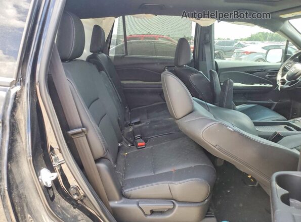 5FNYF8H98MB013122 2021 HONDA PASSPORT Black Rear interior view