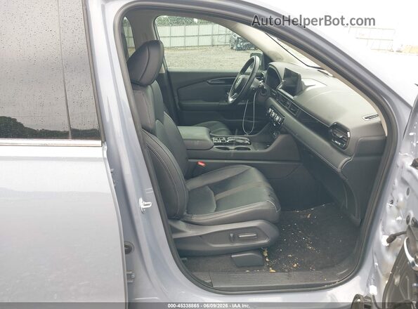 5FNYG2H72PB016000 2023 HONDA PILOT Gray Front interior view
