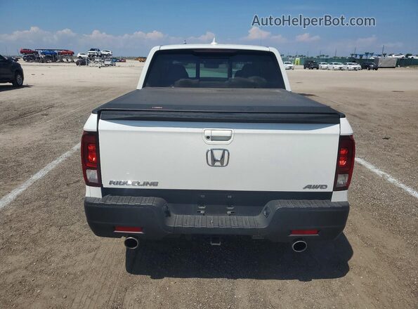 5FPYK3F52PB021033 2023 HONDA RIDGELINE White Vista trasera