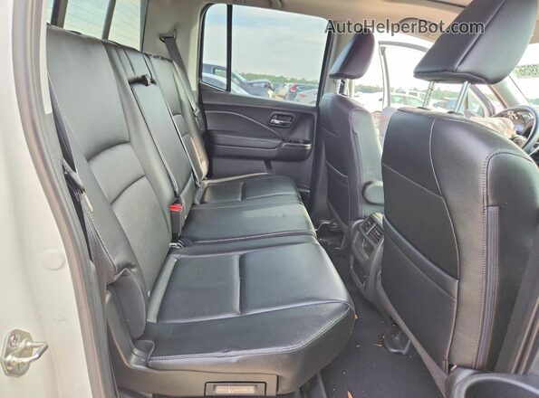 5FPYK3F71JB013479 2018 HONDA RIDGELINE White Vista de los asientos traseros