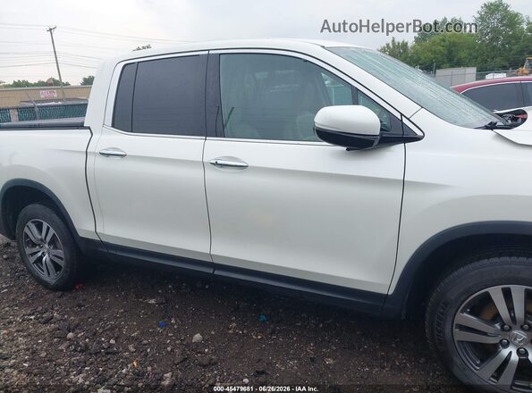 5FPYK3F72HB010682 2017 HONDA RIDGELINE White Rear interior view