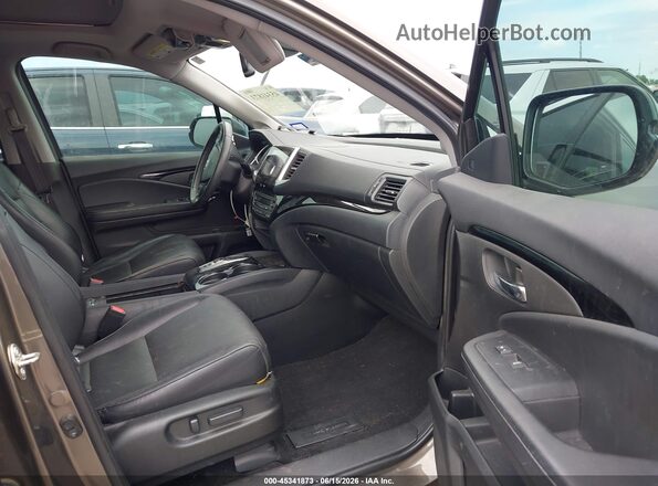 5FPYK3F77LB007169 2020 HONDA RIDGELINE Brown Front interior view
