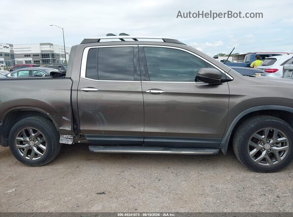 5FPYK3F77LB007169 2020 HONDA RIDGELINE Brown Rear interior view
