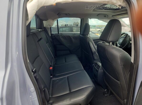 5FPYK3F79NB038880 2022 HONDA RIDGELINE Blue Vista de los asientos traseros