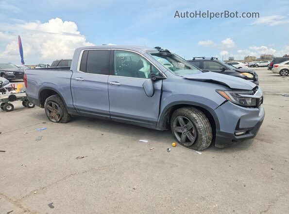 5FPYK3F79NB038880 2022 HONDA RIDGELINE Blue Delantero derecho