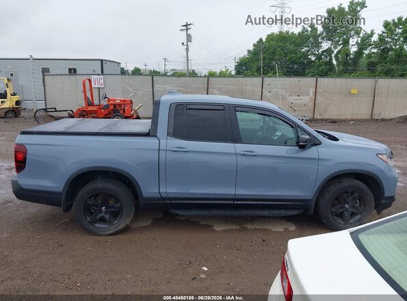 5FPYK3F84NB027116 2022 HONDA RIDGELINE Gray Rear interior view