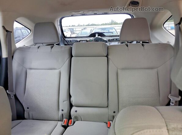 5J6RM4H30GL014601 2016 HONDA CR-V Silver Rear seats view