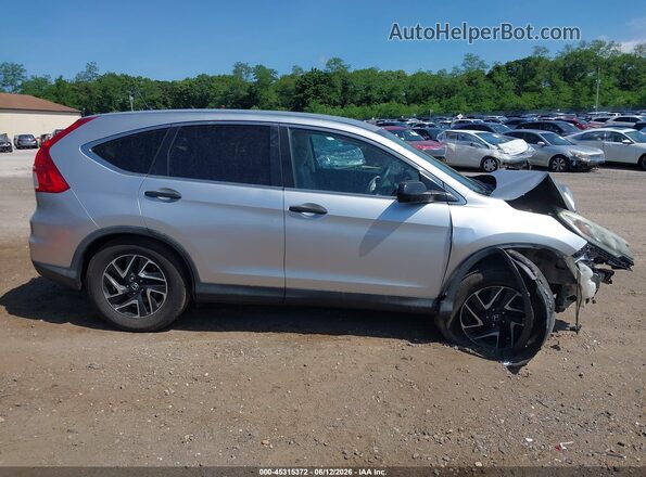 5J6RM4H45GL038563 2016 HONDA CR-V Silver Widok wnętrza z tyłu