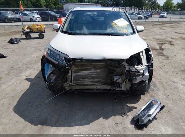 5J6RM4H56GL011428 2016 HONDA CR-V White Rear interior view
