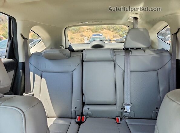 5J6RM4H99GL042806 2016 HONDA CR-V Silver Rear seats view