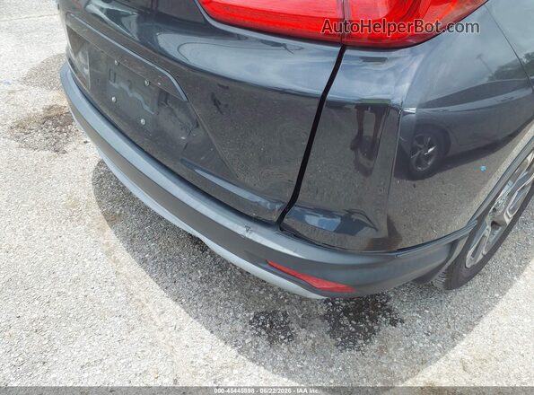 5J6RW1H55KA015502 2019 HONDA CR-V Gray Widok wnętrza z tyłu