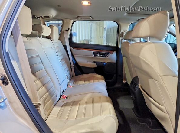 5J6RW1H57JL013530 2018 HONDA CR-V Tan Widok wnętrza z tyłu