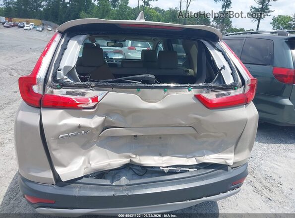 5J6RW1H89KL002881 2019 HONDA CR-V Beige Front view