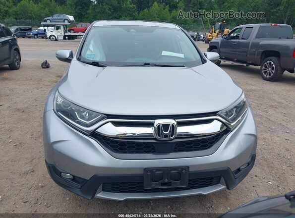 5J6RW2H50KL024408 2019 HONDA CR-V Silver Widok wnętrza z tyłu