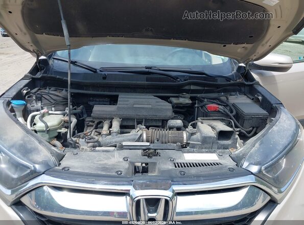 5J6RW2H53JL016673 2018 HONDA CR-V Beige Vista de los asientos traseros
