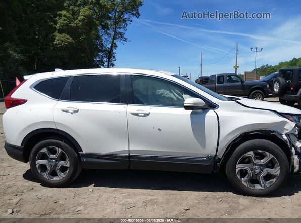 5J6RW2H56HL048981 2017 HONDA CR-V White Widok wnętrza z tyłu
